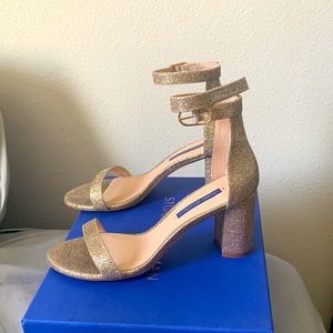 Stuart Weitzman 75 Less Nudist sandals.